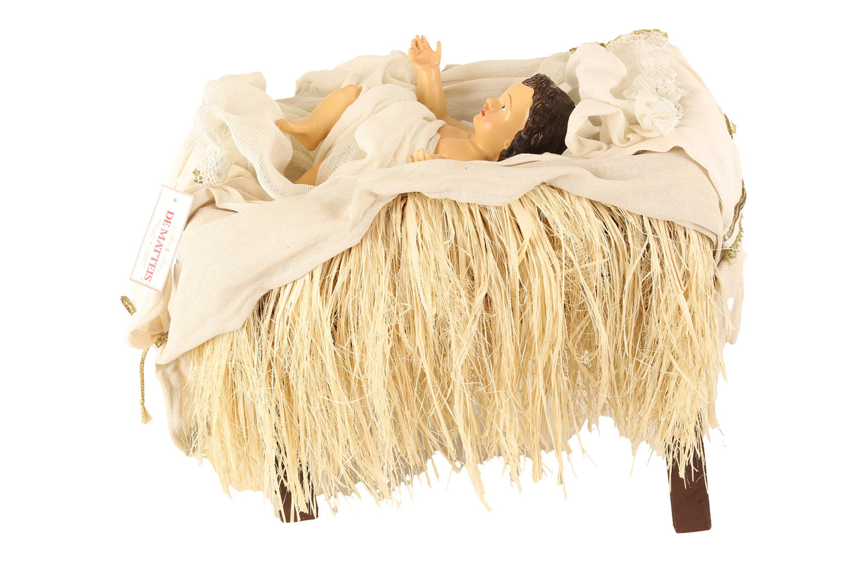 De Matteis, Gesù Bambino per natività 108 cm adagiato su culla in legno con paglia naturale e tessuti bianchi decorati - DeMatteis.it