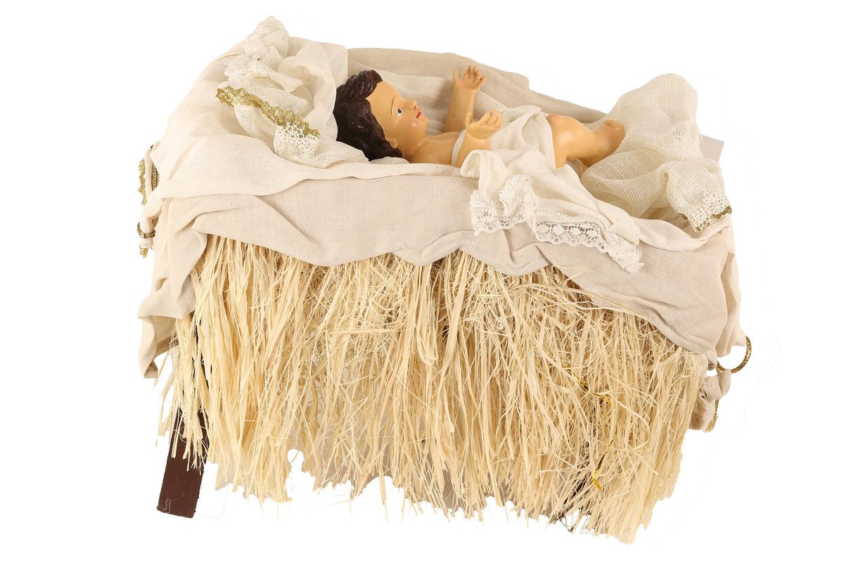 De Matteis, Gesù Bambino per Natività 108 cm in culla di vimini con tessuti bianchi e ricami dorati, capelli castani e braccia sollevate - DeMatteis.it