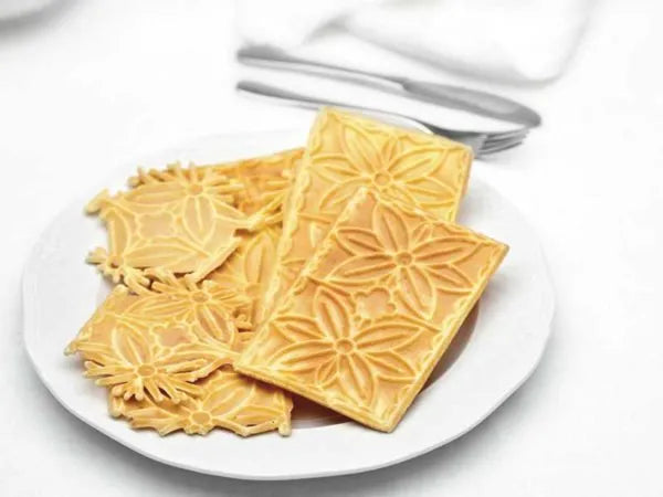 Ferro Ferratelle Elettrico 5025100: Accessorio da cucina in ferro battuto per preparare tradizionali dolci abruzzesi con elegante disegno a fiori. | Dematteis.it