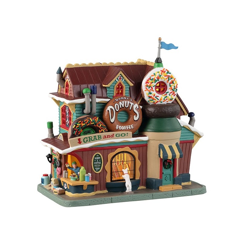Danny's Donuts & Coffee Lemax negozio di ciambelle per villaggio con architettura colorata, grande ciambella decorativa sul tetto e illuminazione interna per collezioni Lemax. | Dematteis.it