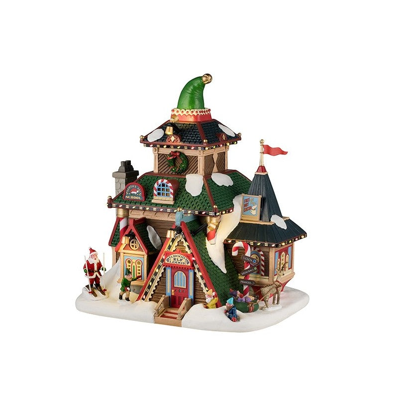 Elwood's Elf Lodge Lemax con cappello verde da elfo, edificio illuminato del Villaggio Natale Lemax con architettura fantasiosa e dettagli colorati | Dematteis.it