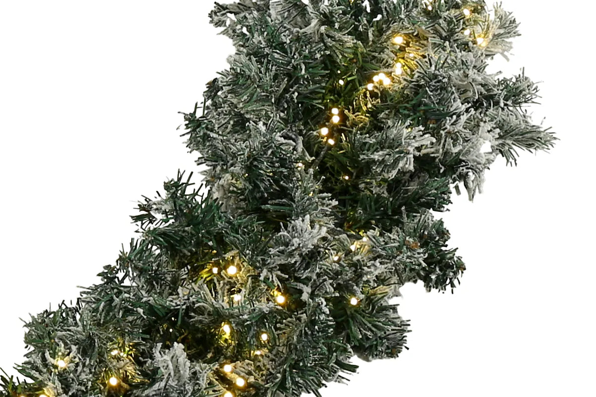 De Matteis, Festone innevato 2,7 m 500 LED reversibili caldo freddo con rami di pino verde ricoperti di neve artificiale bianca e luci LED dorate accese - DeMatteis.it