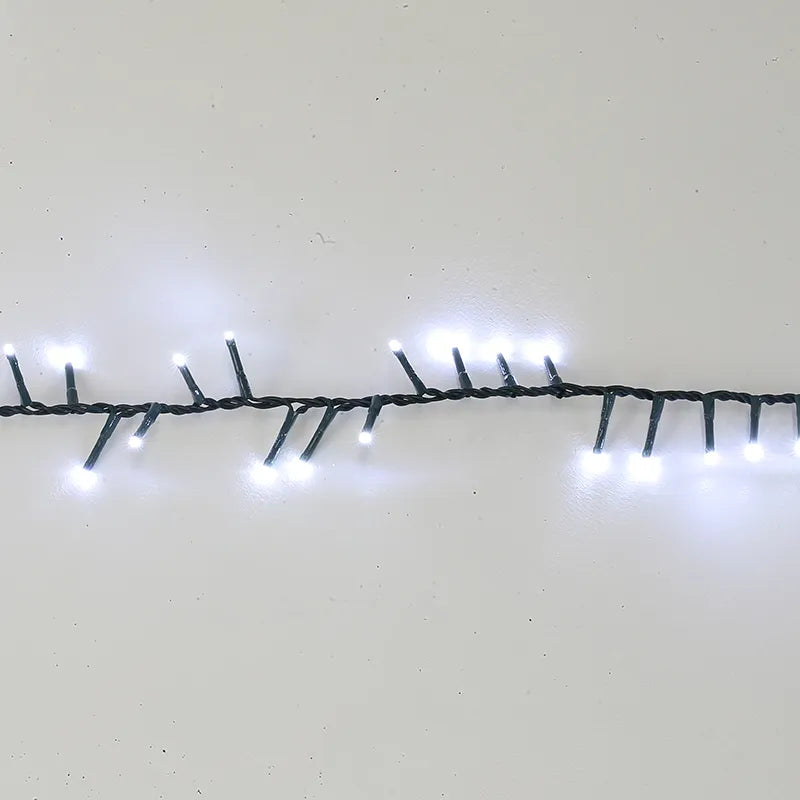De Matteis, Luci Natale 500 Led 10 m reversibili caldo freddo con cavo verde scuro e led bianchi accesi su sfondo neutro - DeMatteis.it