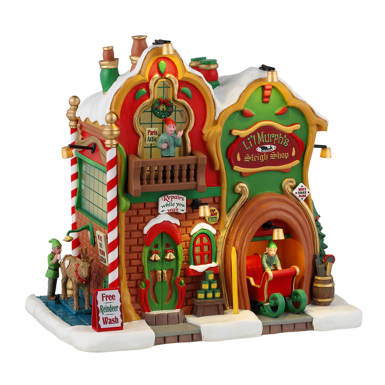 Li'l Murph's Sleigh Shop Lemax: colorata officina per slitte del Villaggio Natale Lemax con tetti dorati, pareti rosse e verdi, personaggi elfi e servizio riparazioni gratuito | Dematteis.it
