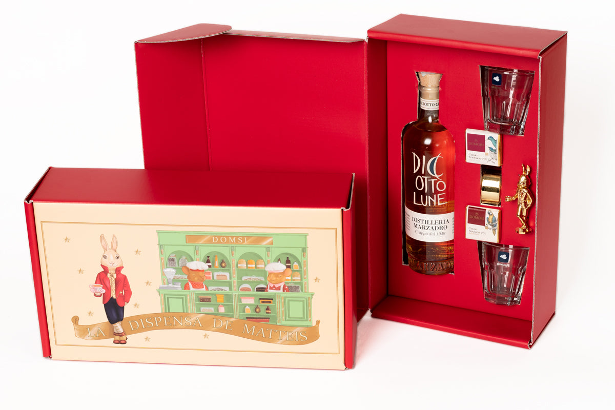 Box Regalo La Dispensa De Matteis Grappa con bottiglia Diciotto Lune Marzadro, bicchieri da degustazione e cioccolatini Domori - DeMatteis.it