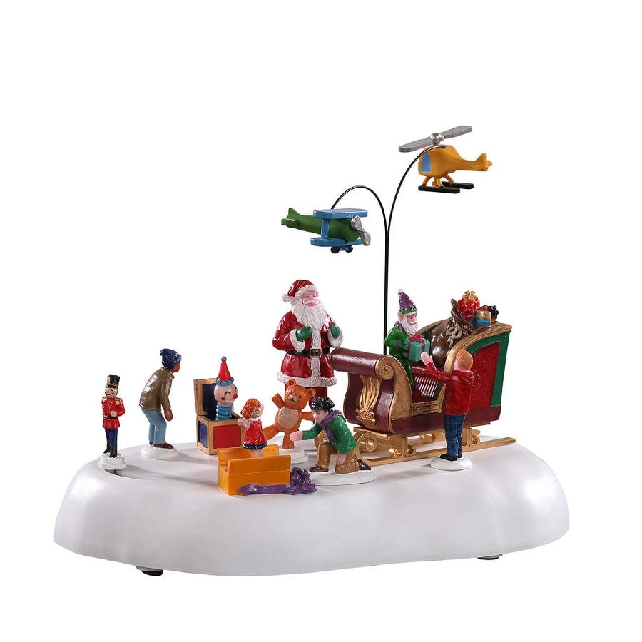 Jolly Toys Lemax villaggio natalizio animato con Babbo Natale e elicotteri in movimento per decorazioni natalizie - DeMatteis.it