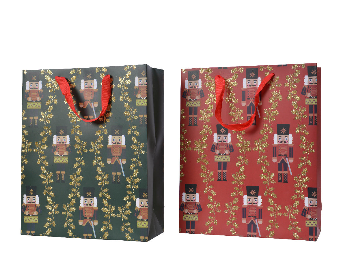 Busta Regalo Disegno Schiaccianoci per confezionamento natalizio dimensioni 10x26x32 cm con manici rossi - DeMatteis.it