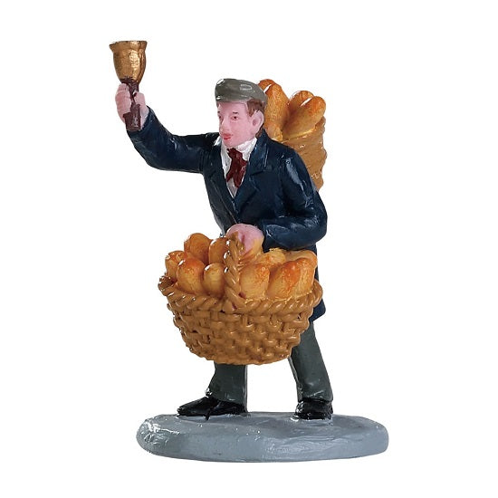 Bread Peddler Lemax figurina decorativa venditore di pane per villaggi natalizi - DeMatteis.it