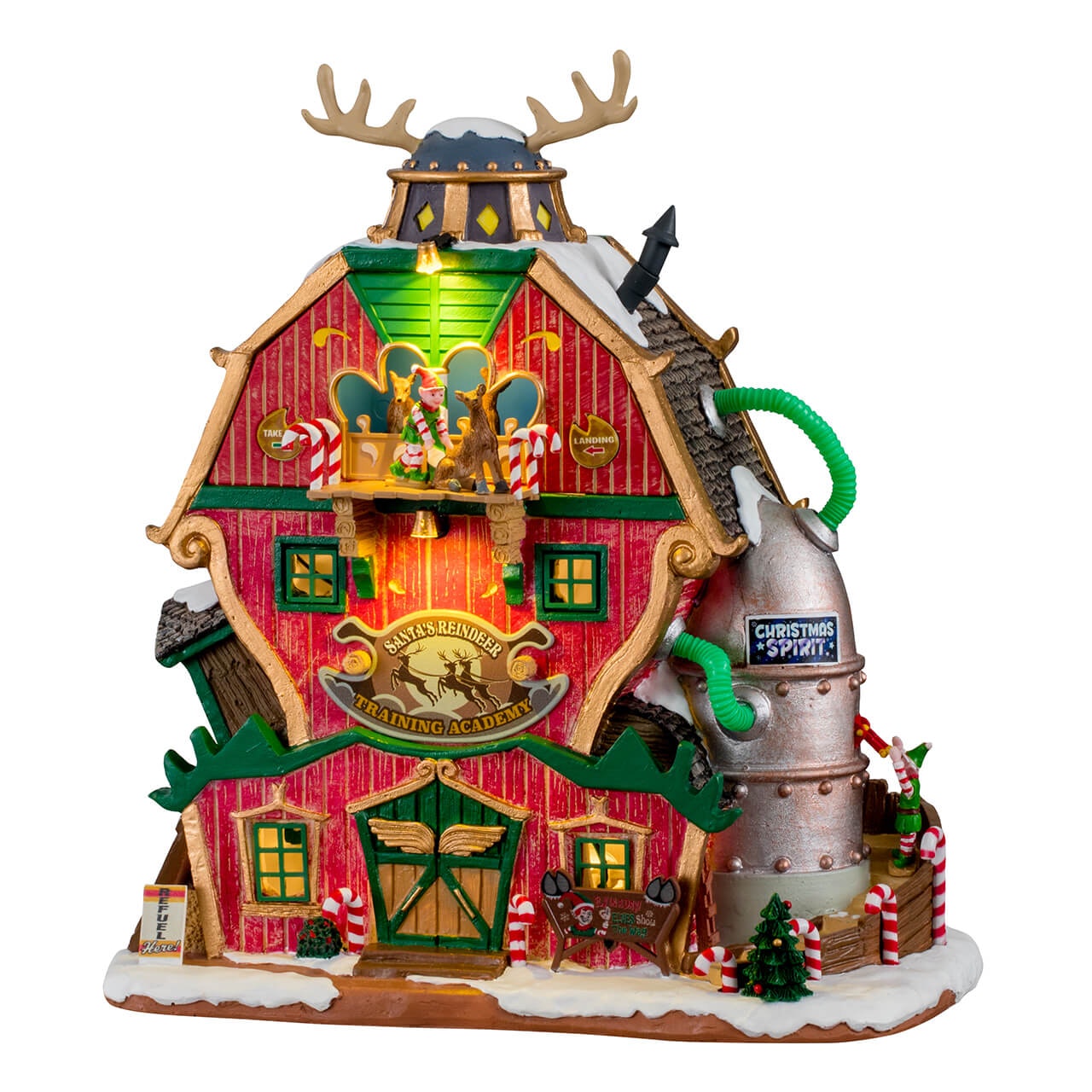 Santa's Reindeer Training Academy Lemax illuminata con facciata rossa e verde, Accademia di Addestramento Renne del Villaggio Lemax con dettagli dipinti a mano. | Dematteis.it