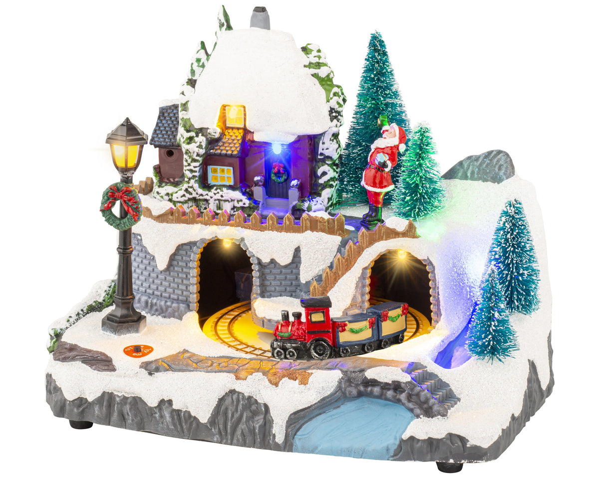 Kaemingk, Villaggio Natalizio Con Movimento Multi 13x20x17 cm con trenino su binari in galleria, casetta illuminata, lampione e Babbo Natale, decorazione per Natale - DeMatteis.it