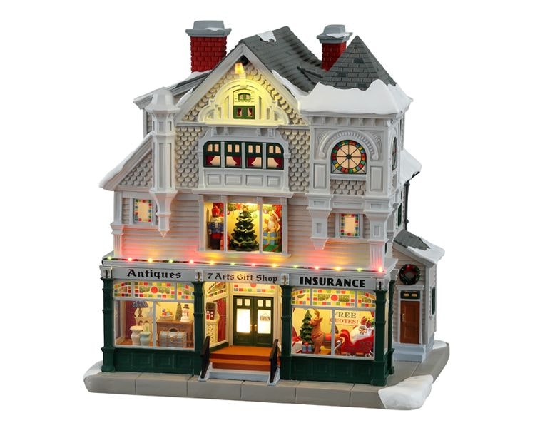 Antique E Gift Shop Lemax: elegante Negozio Antiquariato Lemax vittoriano a tre piani con vetrine illuminate verdi, torretta decorativa e architettura dettagliata per Villaggio Lemax. | Dematteis.it