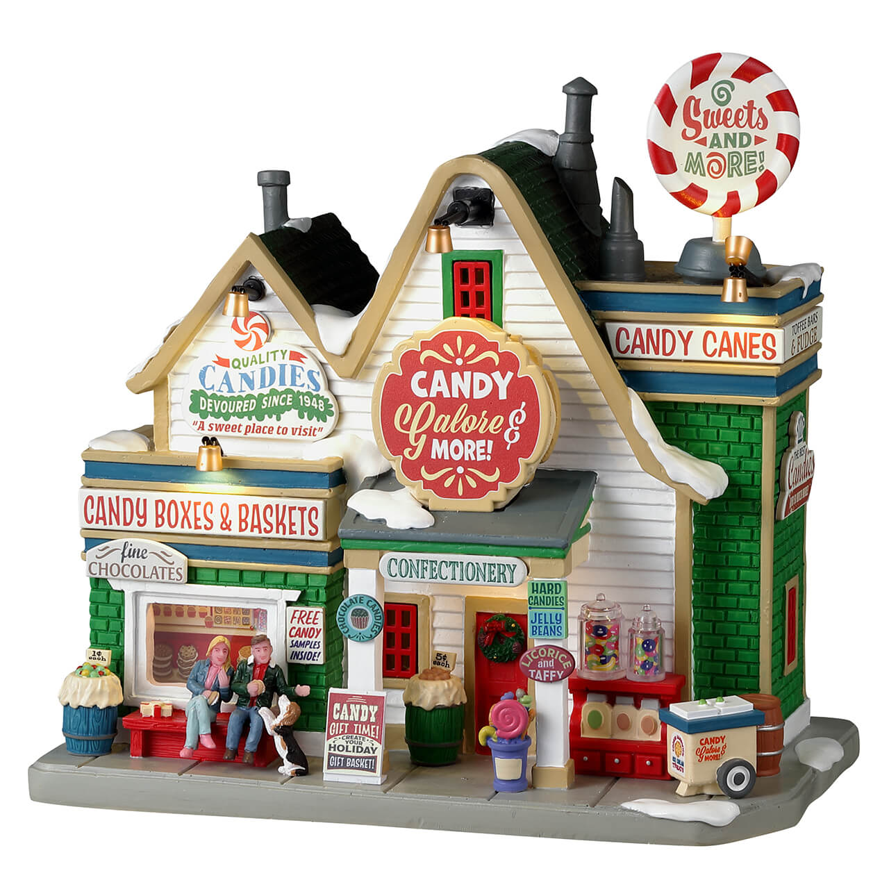 Negozio di Caramelle Lemax Candy Galore & More del Villaggio Lemax Caddington con architettura vittoriana, insegne colorate e figurine | Dematteis.it