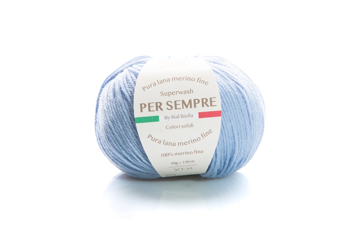 Rial, Filato Lana 100% 50 g Colore 706 gomitolo azzurro chiaro in lana merino fine con fascia Per Sempre su fondo bianco - DeMatteis.it