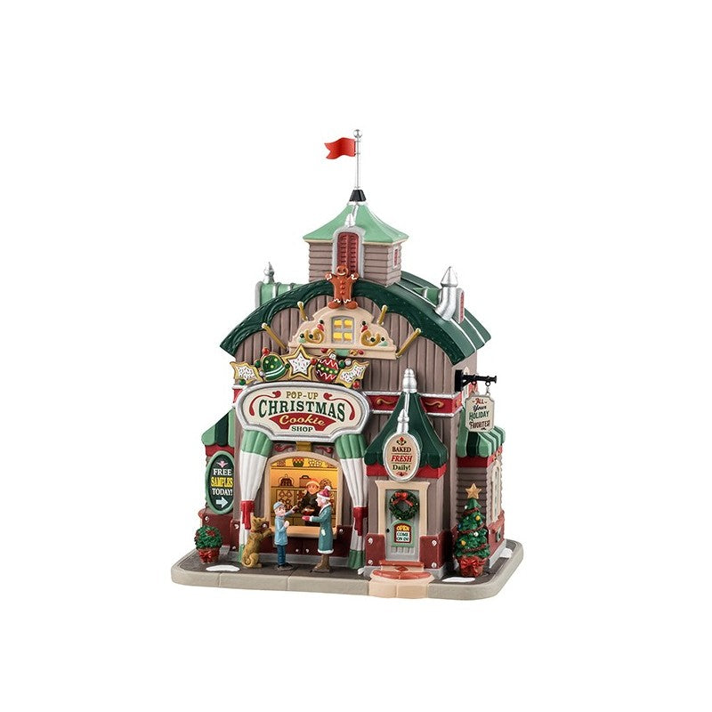 Pop Up Christmas Cookie Shop Lemax (Negozio di Biscotti Natalizi) della collezione Caddington Village con architettura vittoriana, cupola verde e insegna decorativa per Villaggio Natale Lemax | Dematteis.it