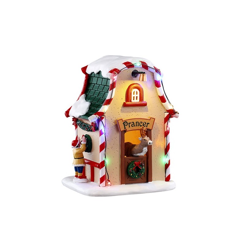 Prancer's Den Lemax villaggio natale illuminato con renna all'interno, decorazioni bastoncini zucchero rossi bianchi e neve sul tetto | Dematteis.it