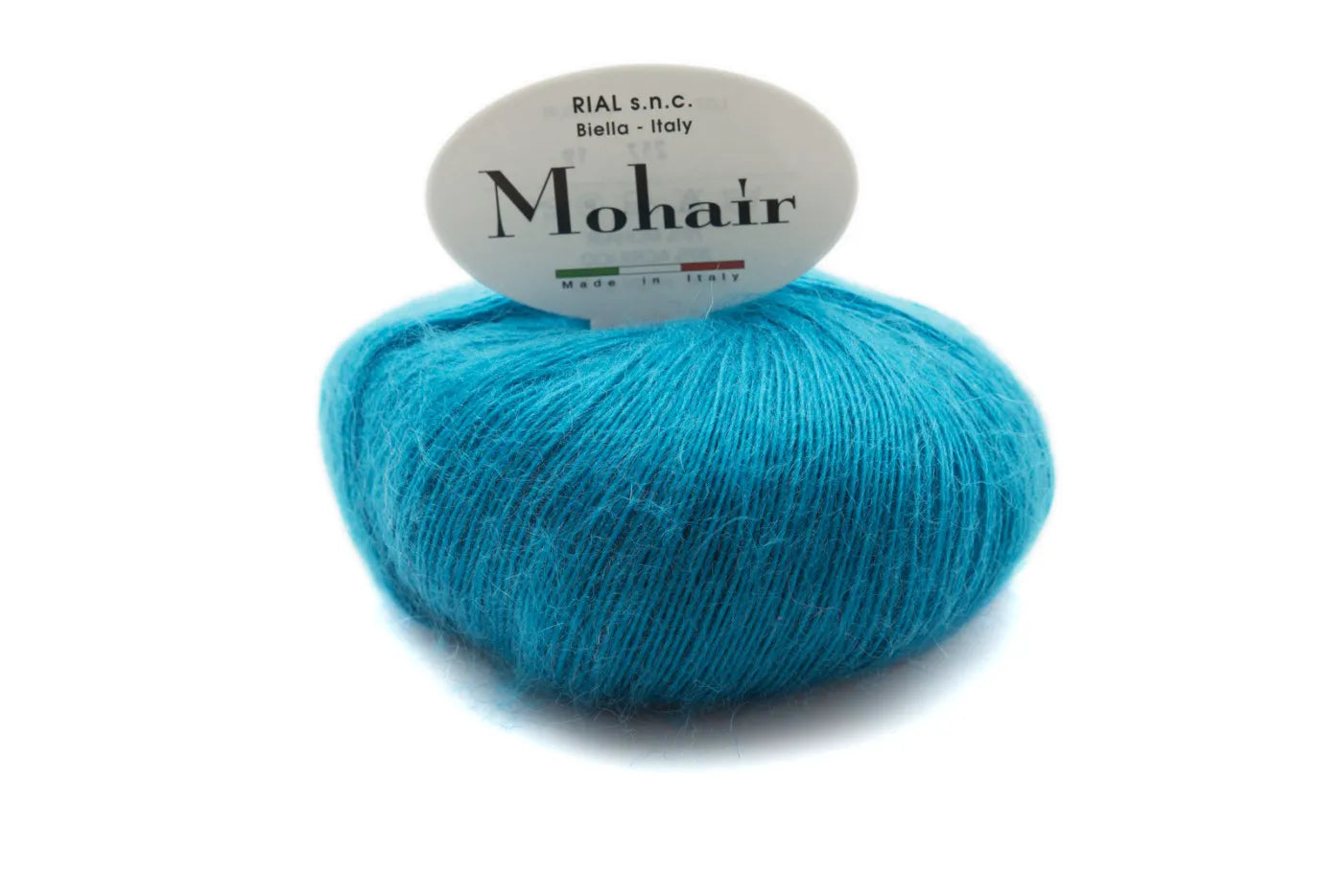 Rial, Filato Mohair 50 g colore 19 in gomitolo azzurro turchese con etichetta ovale bianca per lavori a maglia e uncinetto - DeMatteis.it