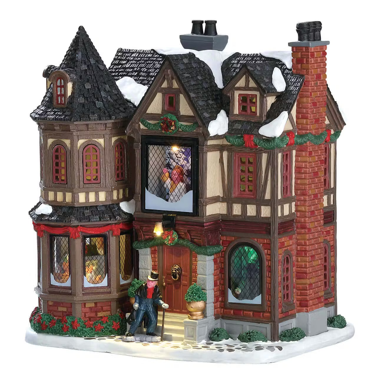 Scrooge's Manor Lemax: palazzo vittoriano illuminato con torrette, bovindi e camino in mattoni rossi, decorato con ghirlande natalizie per Villaggio di Natale Lemax. | Dematteis.it