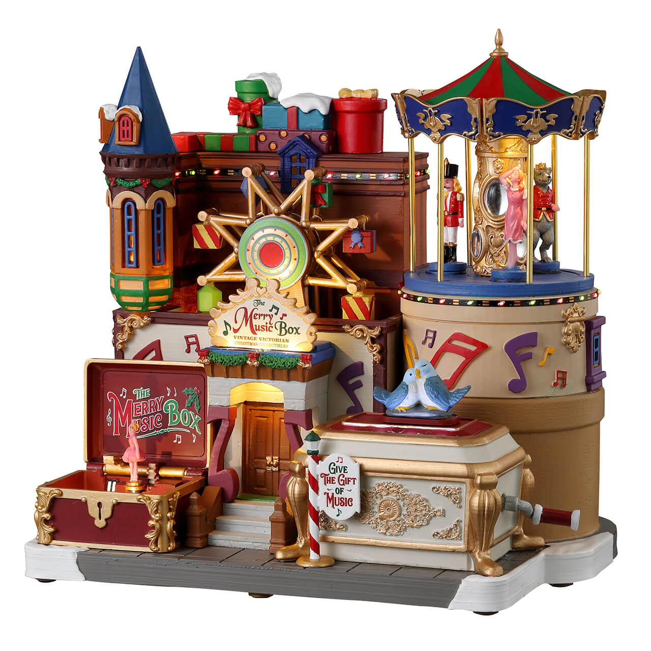 The Merry Music Box Lemax - Casa dei Carillon vittoriana con giostra centrale, torre decorativa e ballerine danzanti per Villaggio di Natale Lemax | Dematteis.it