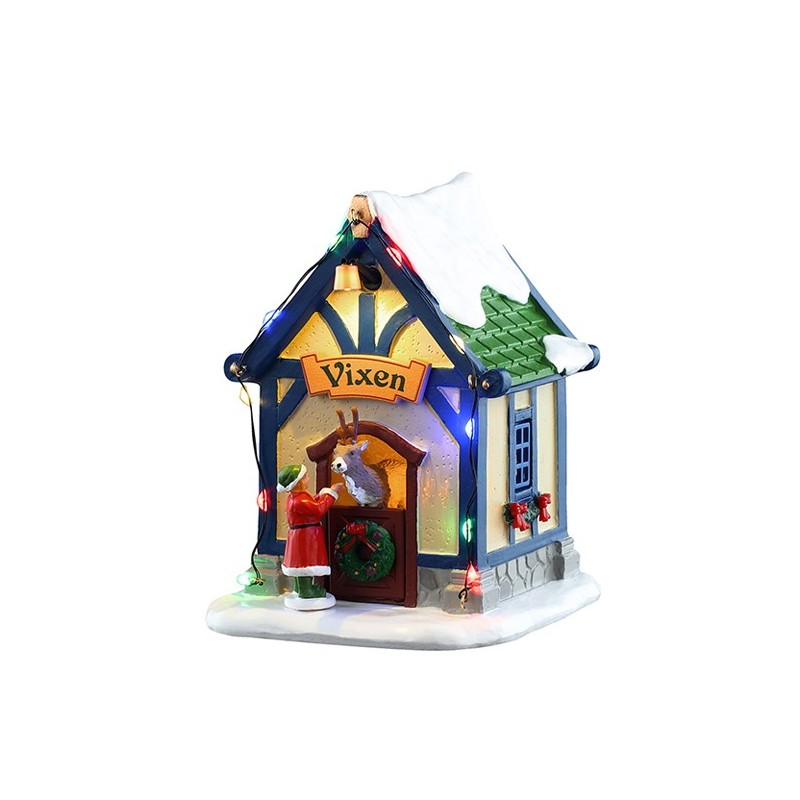 Vixen's Den Lemax casetta illuminata Villaggio Natale con renna all'interno, Babbo Natale e decorazioni natalizie su base innevata | Dematteis.it