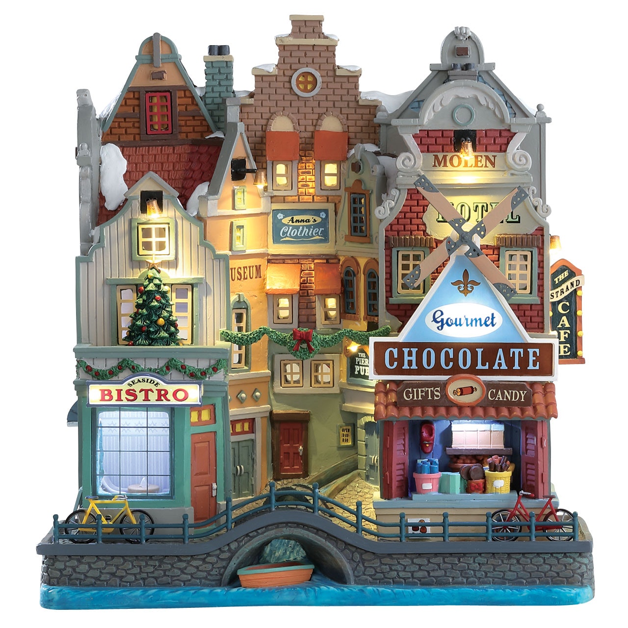 Seaside Christmas Lemax: villaggio di Natale con edifici sul mare illuminati, mulino a vento e negozi caratteristici in stile europeo. | Dematteis.it
