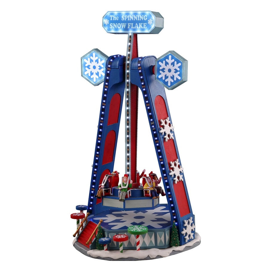 The Spinning Snowflake Lemax, Giostra Paracadute con decorazioni natalizie blu e rosse, fiocchi di neve e figurine del Villaggio di Natale Lemax | Dematteis.it